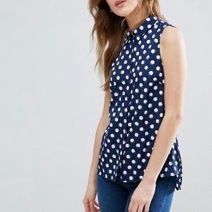 Blue spotted sleeveless button down